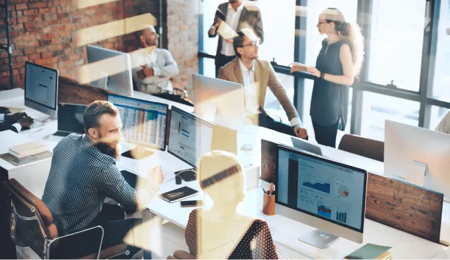 The uMobix team at work in the office